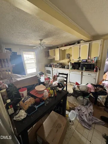 a room with furniture and a window