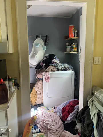 a bedroom with a bed and cabinets