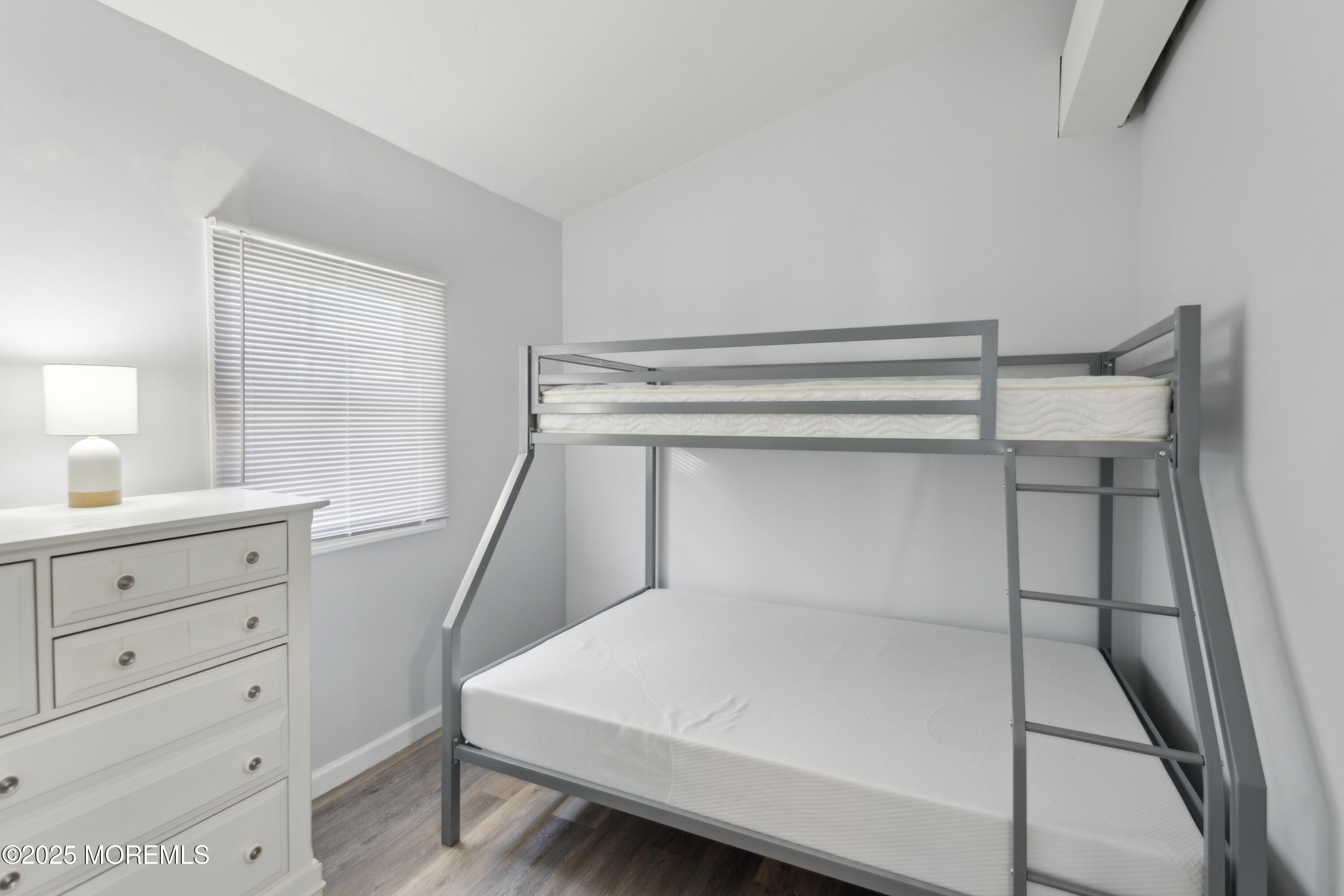131 South Commodore Drive Little Egg Harbor, NJ 08087 - Photo 17 of 25 a bedroom with a bed and a window