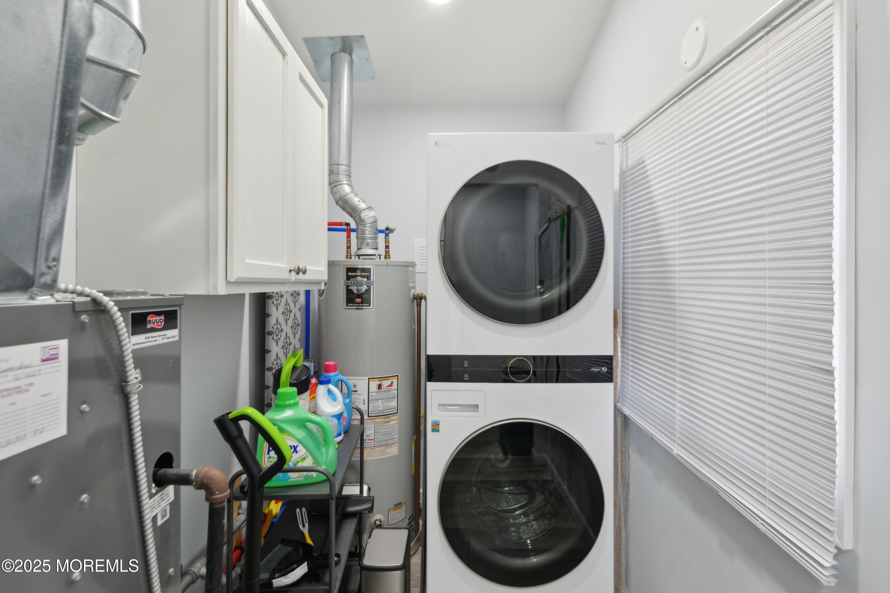 131 South Commodore Drive Little Egg Harbor, NJ 08087 - Photo 20 of 25 a view of a storage and utility room with washer and dryer