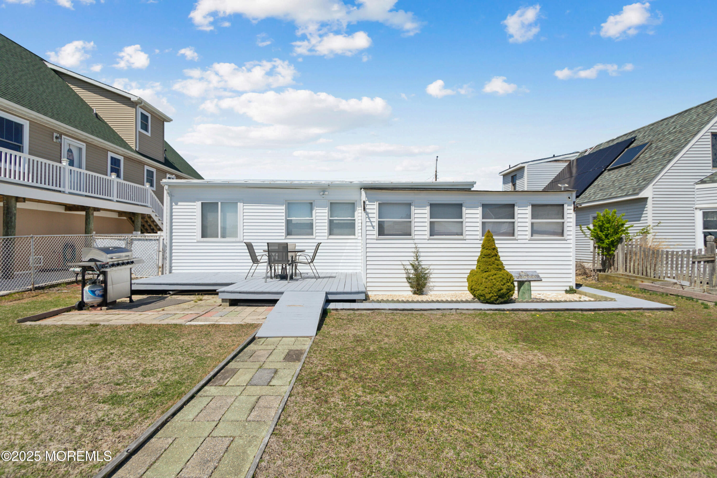 131 South Commodore Drive Little Egg Harbor, NJ 08087 - Photo 22 of 25 a view of a house with swimming pool and sitting area