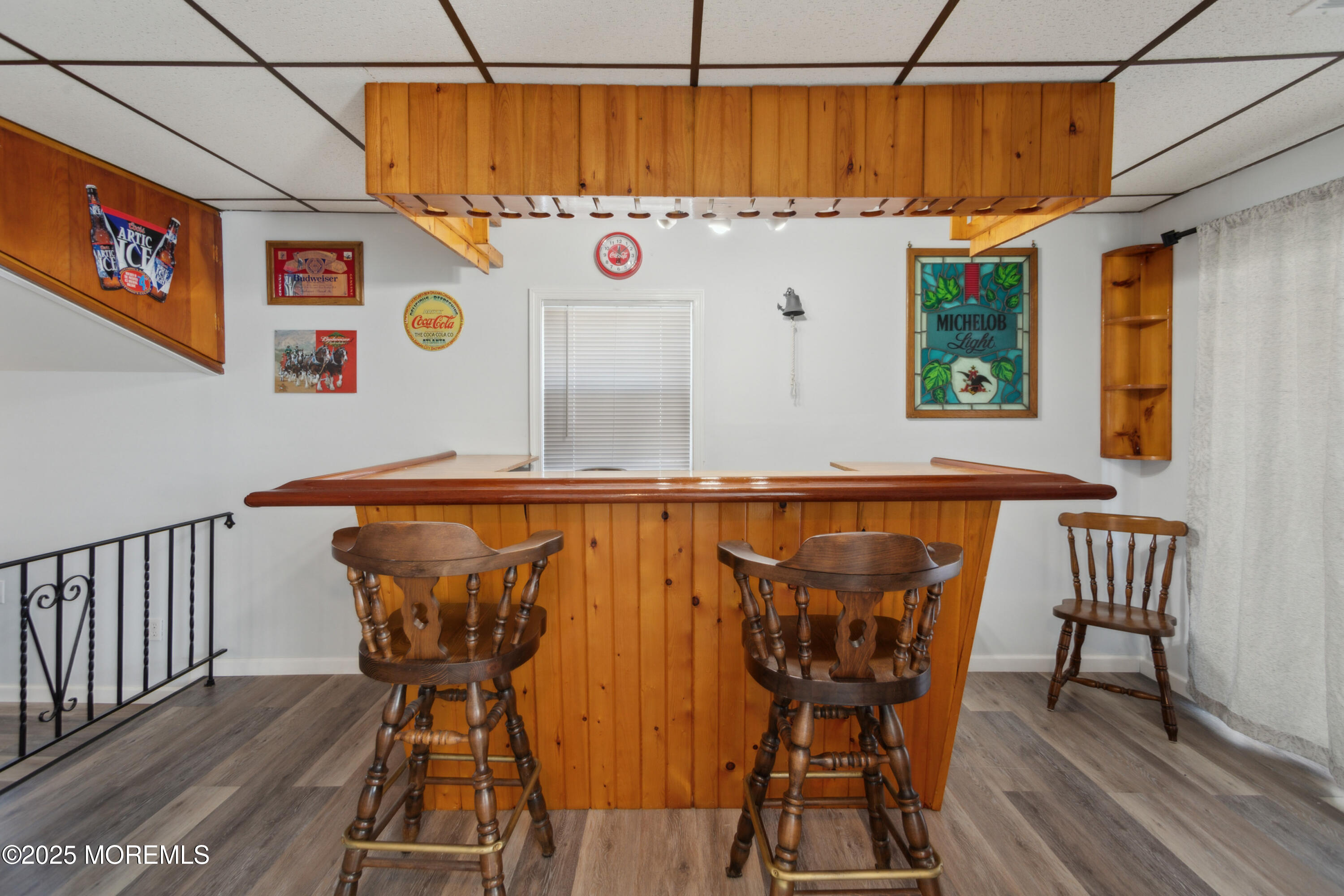 131 South Commodore Drive Little Egg Harbor, NJ 08087 - Photo 6 of 25 a view of a chairs and table in back of a room