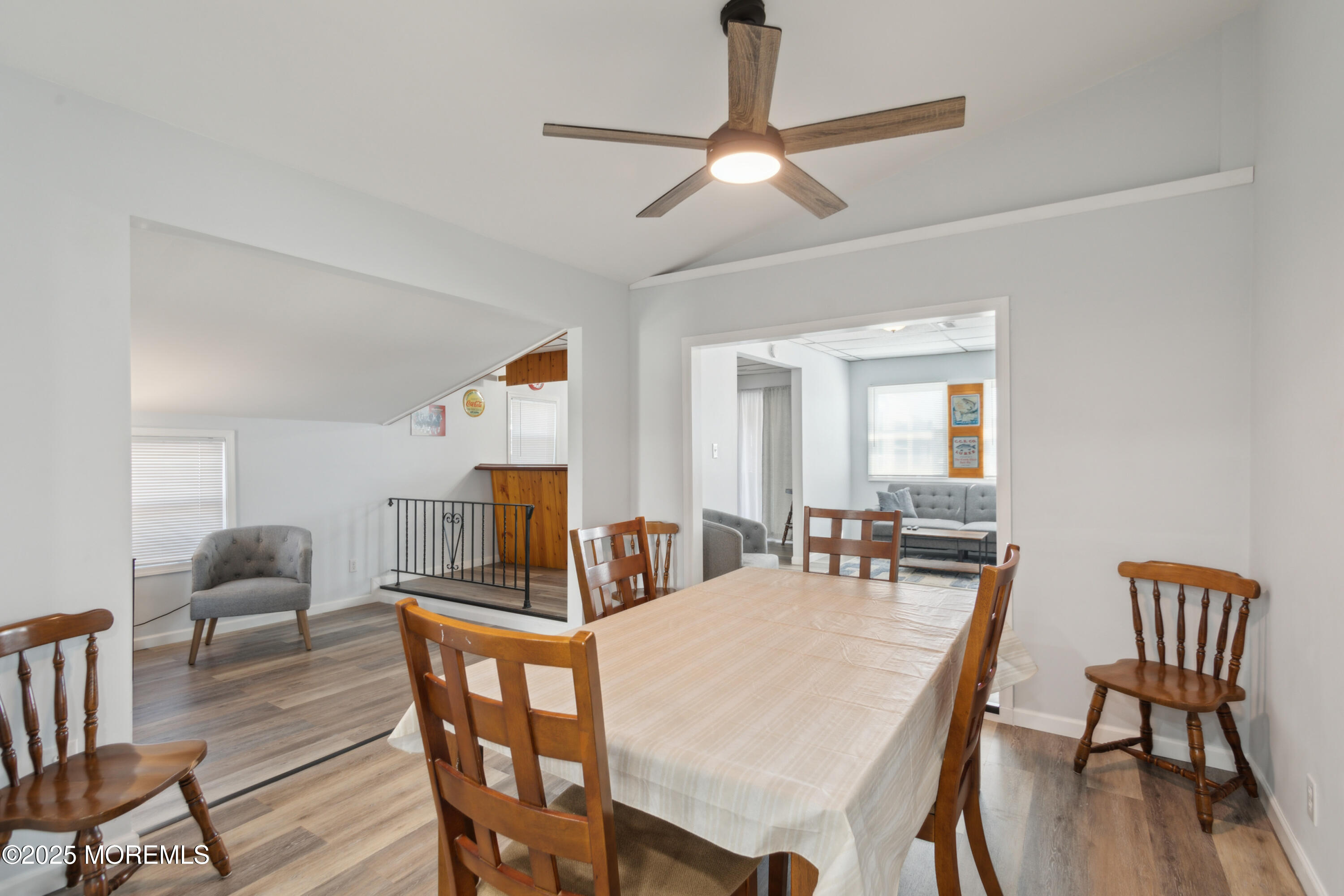 131 South Commodore Drive Little Egg Harbor, NJ 08087 - Photo 10 of 25 a view of a dining room with furniture a rug and wooden floor