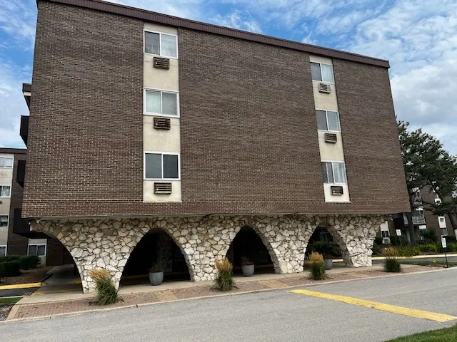 a front view of a building with windows