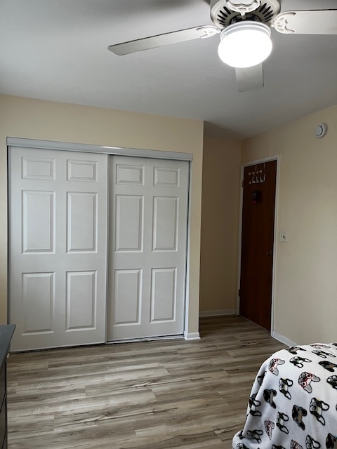 1301 South Finley Road, Unit 414 Lombard, IL 60148 - Photo 13 of 25 a bedroom with a bed and cabinets