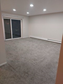 1301 South Finley Road, Unit 414 Lombard, IL 60148 - Photo 5 of 25 an empty room with windows