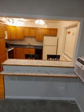 $189,900 | 1301 South Finley Road, Unit 414, Lombard, IL 60148