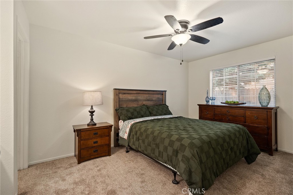 2055 Amanda Way, Unit 29 Chico, CA 95928 - Photo 4 of 19 a bedroom with a bed and window