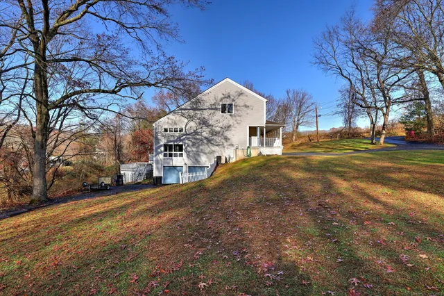 a view of a town with large trees