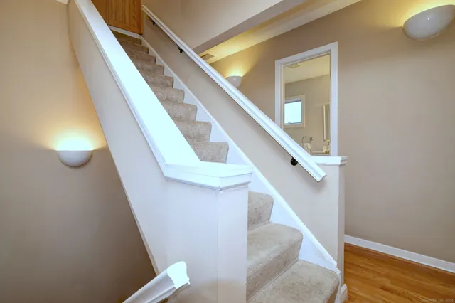 a bathroom with a bathtub and window