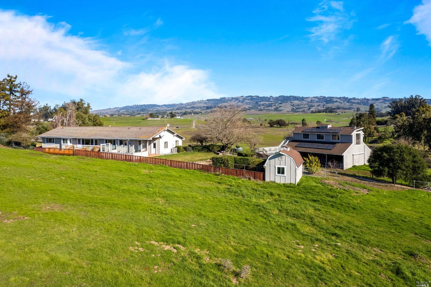 1682 Adobe Road Petaluma, CA 94954 - Photo 1 of 1 a view of a house with a big yard