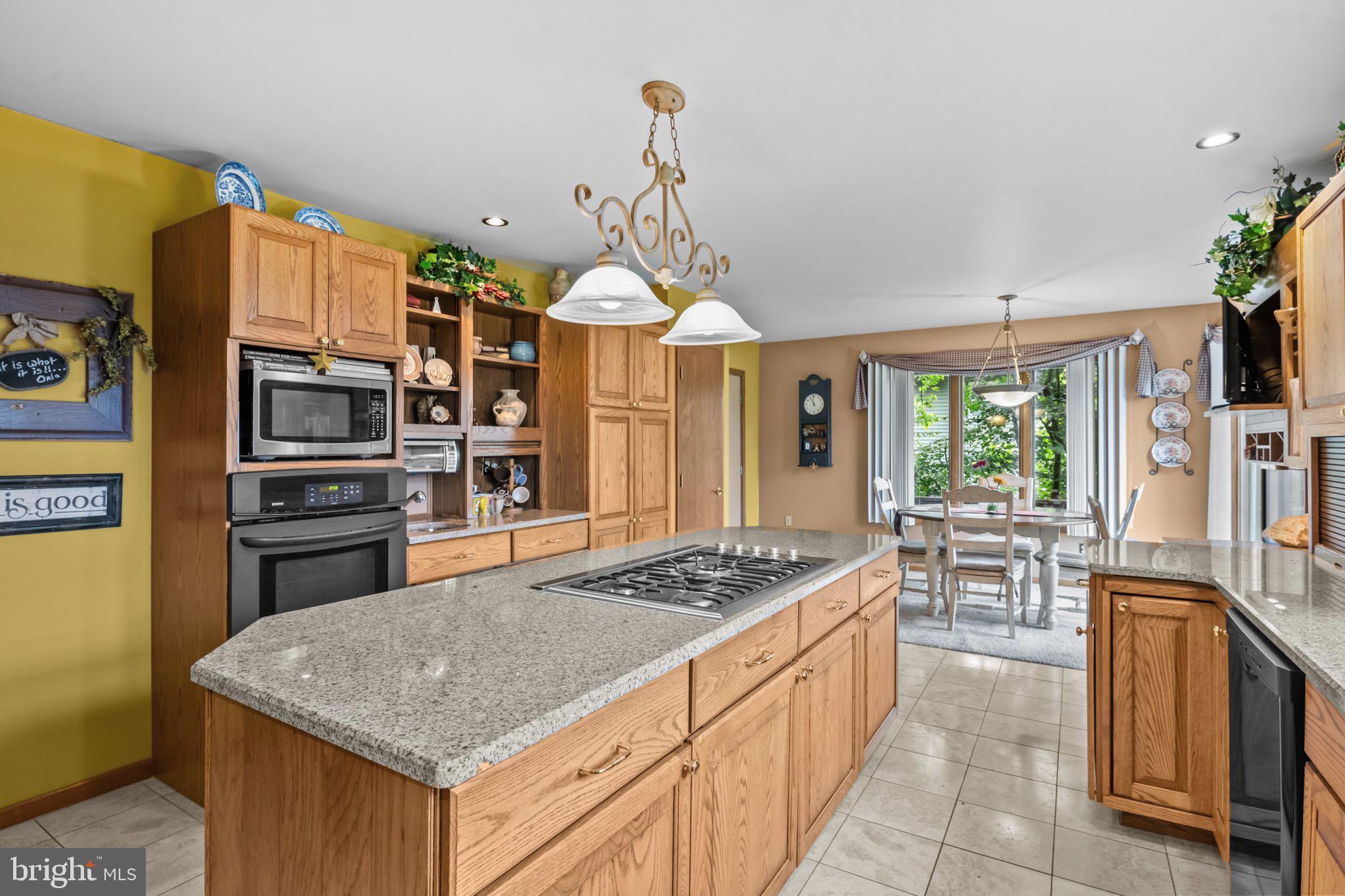 16 Golfview Lane Reading, PA 19606 - Photo 19 of 70 a kitchen with stainless steel appliances granite countertop a stove oven and a refrigerator