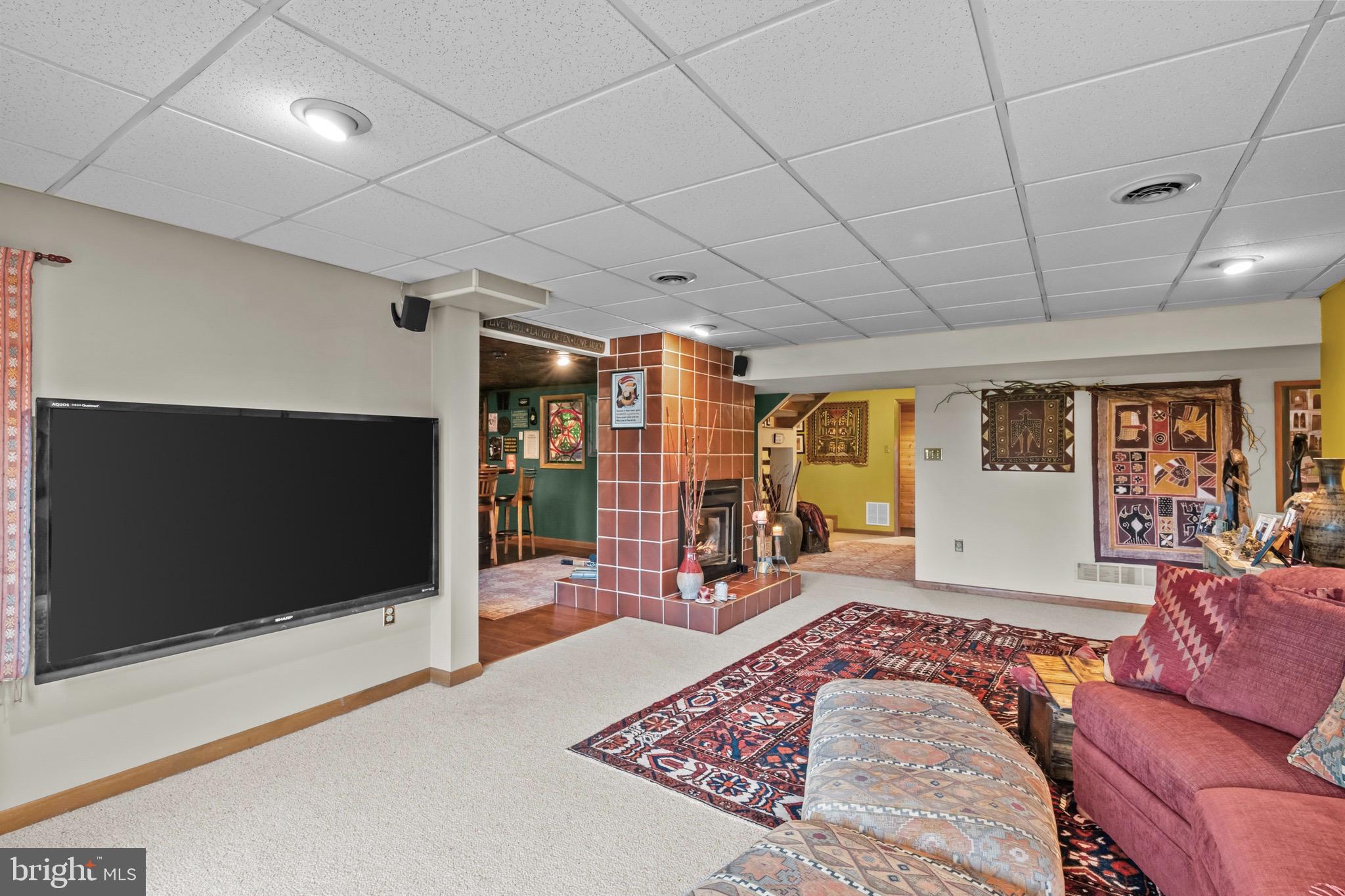 16 Golfview Lane Reading, PA 19606 - Photo 37 of 70 a living room with furniture flat screen tv and a large window