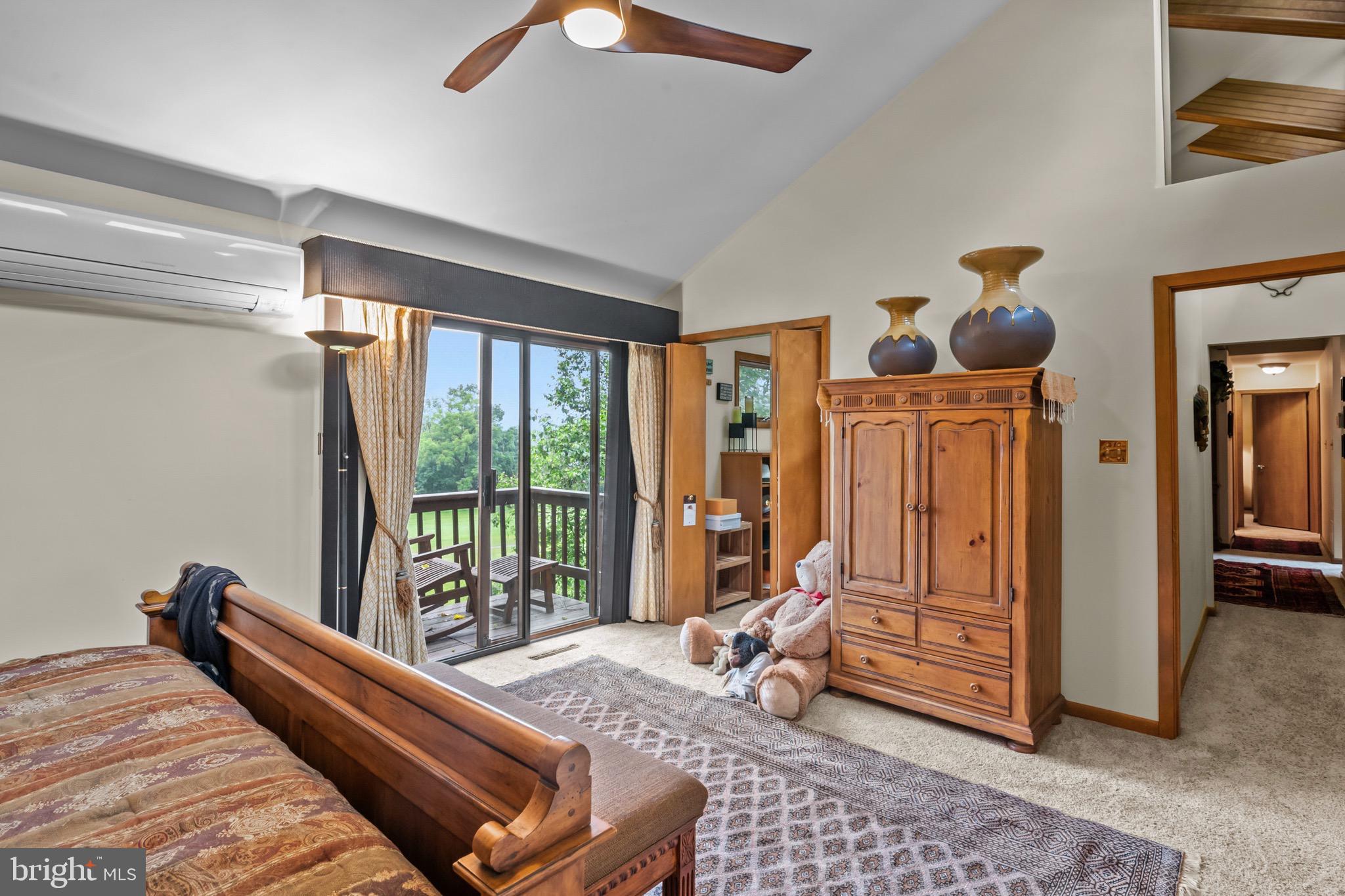 16 Golfview Lane Reading, PA 19606 - Photo 42 of 70 a bedroom with a bed and large windows