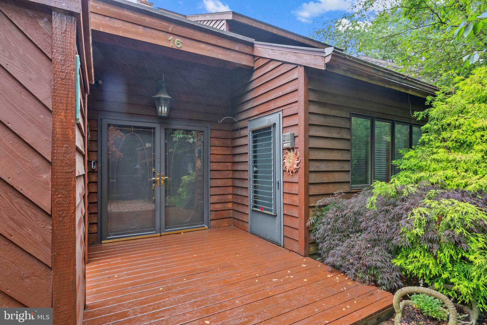 16 Golfview Lane Reading, PA 19606 - Photo 5 of 70 a backyard of a house with plants and tree