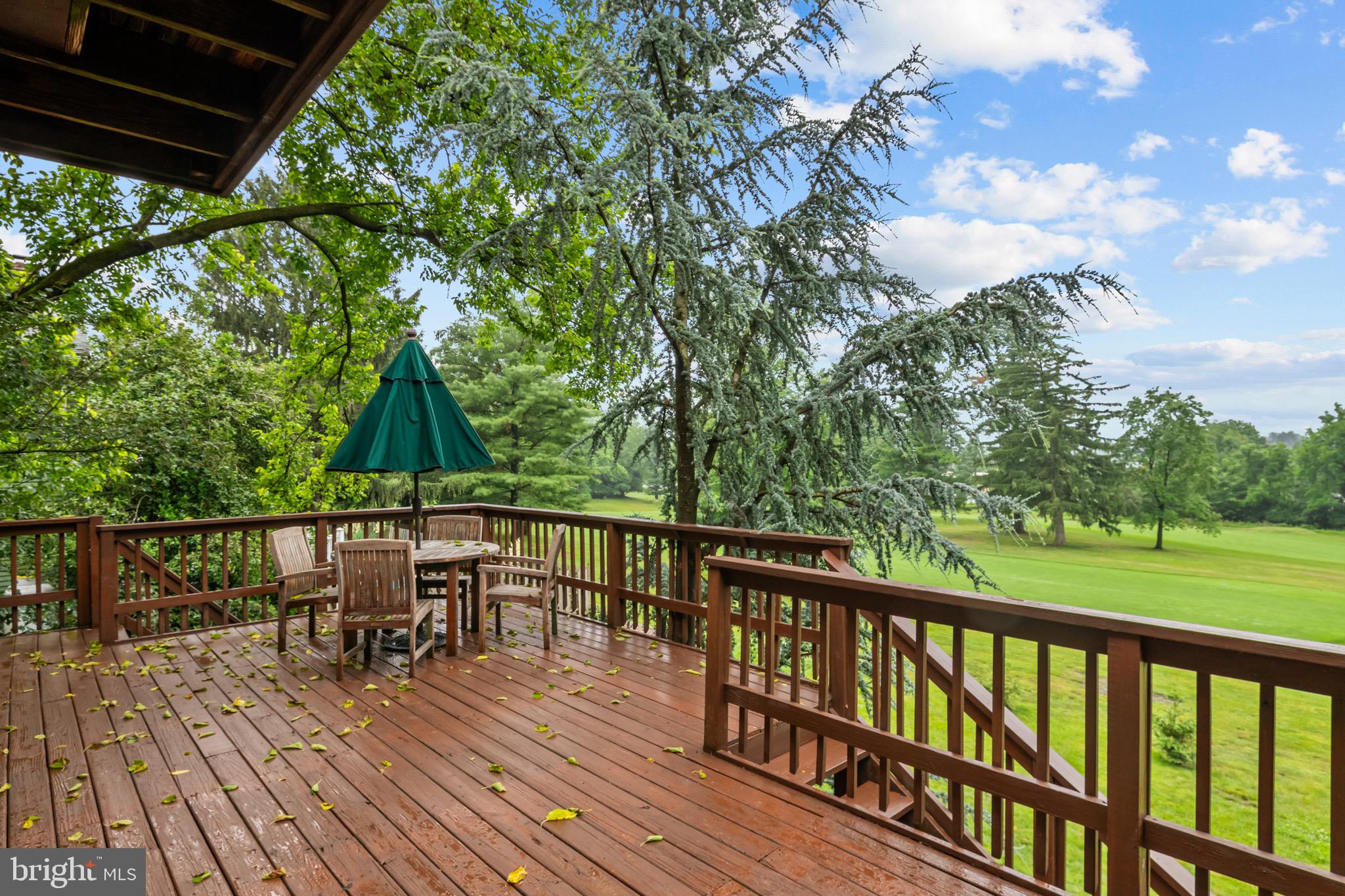 16 Golfview Lane Reading, PA 19606 - Photo 57 of 70 a view of a deck with wooden floor and outdoor seating