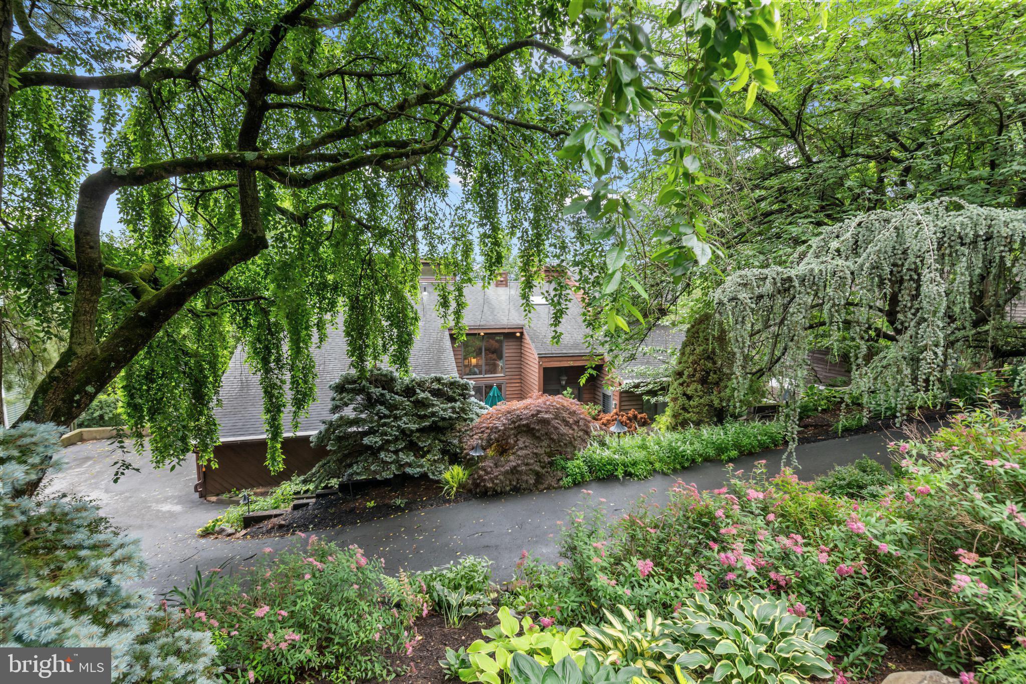 16 Golfview Lane Reading, PA 19606 - Photo 7 of 70 an aerial view of a house with a yard and large trees