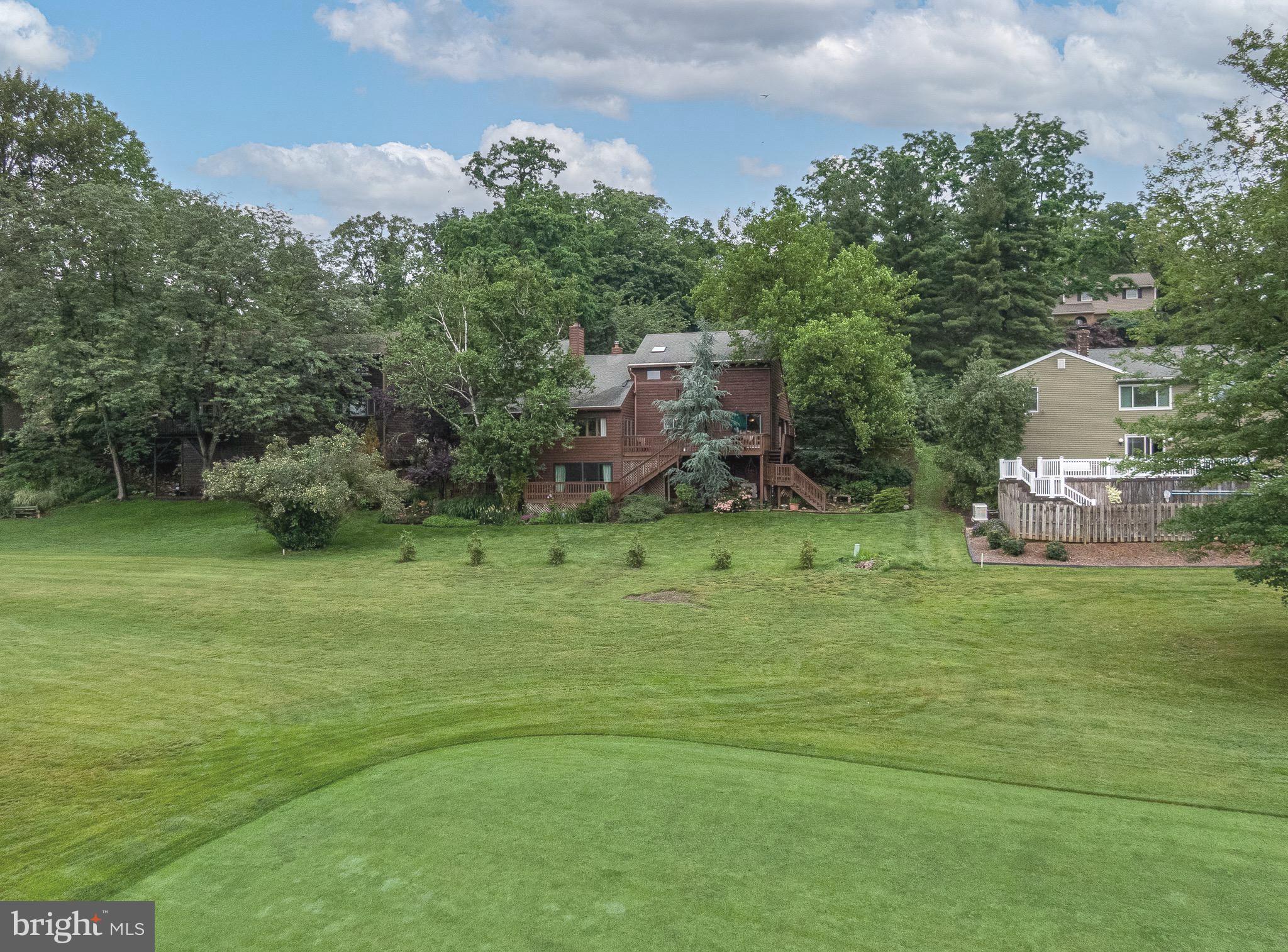 16 Golfview Lane Reading, PA 19606 - Photo 9 of 70 a backyard of a house with lots of green space