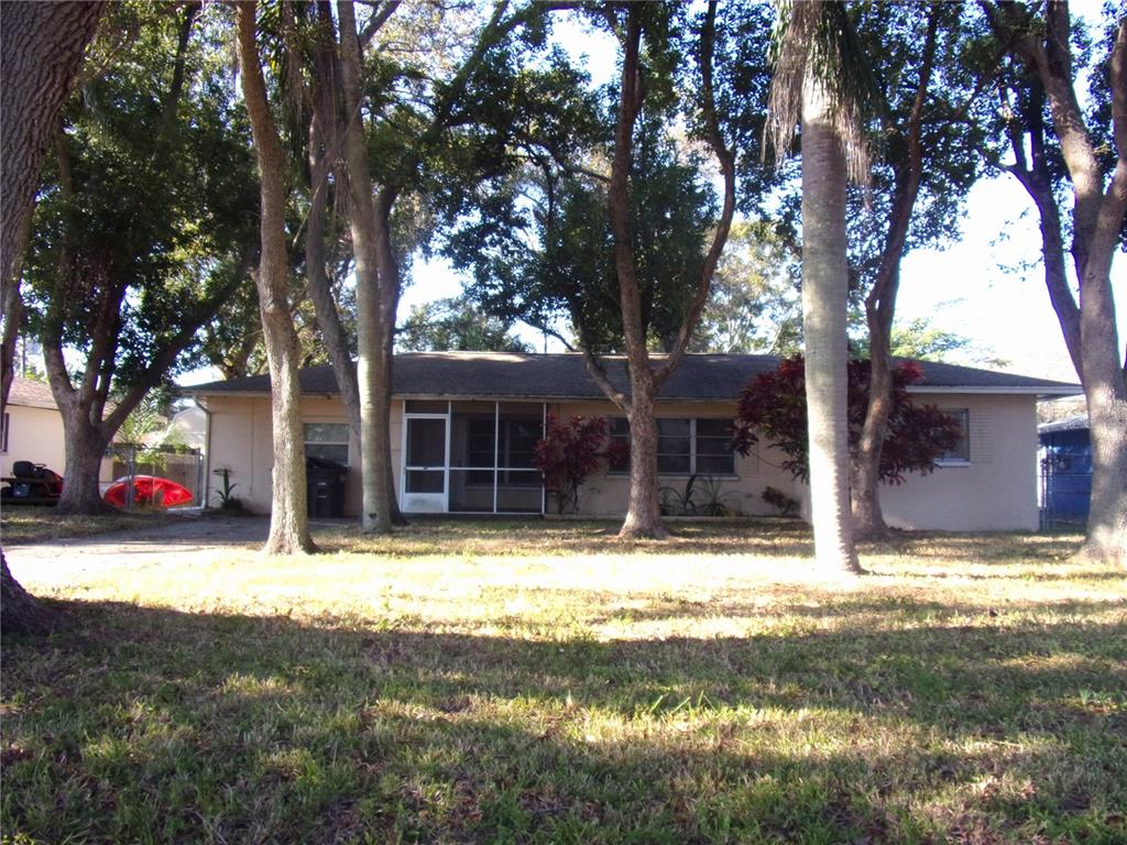 2164 Northeast Coachman Road Clearwater, FL 33765 - Photo 1 of 1 a view of a house with snow in the yard