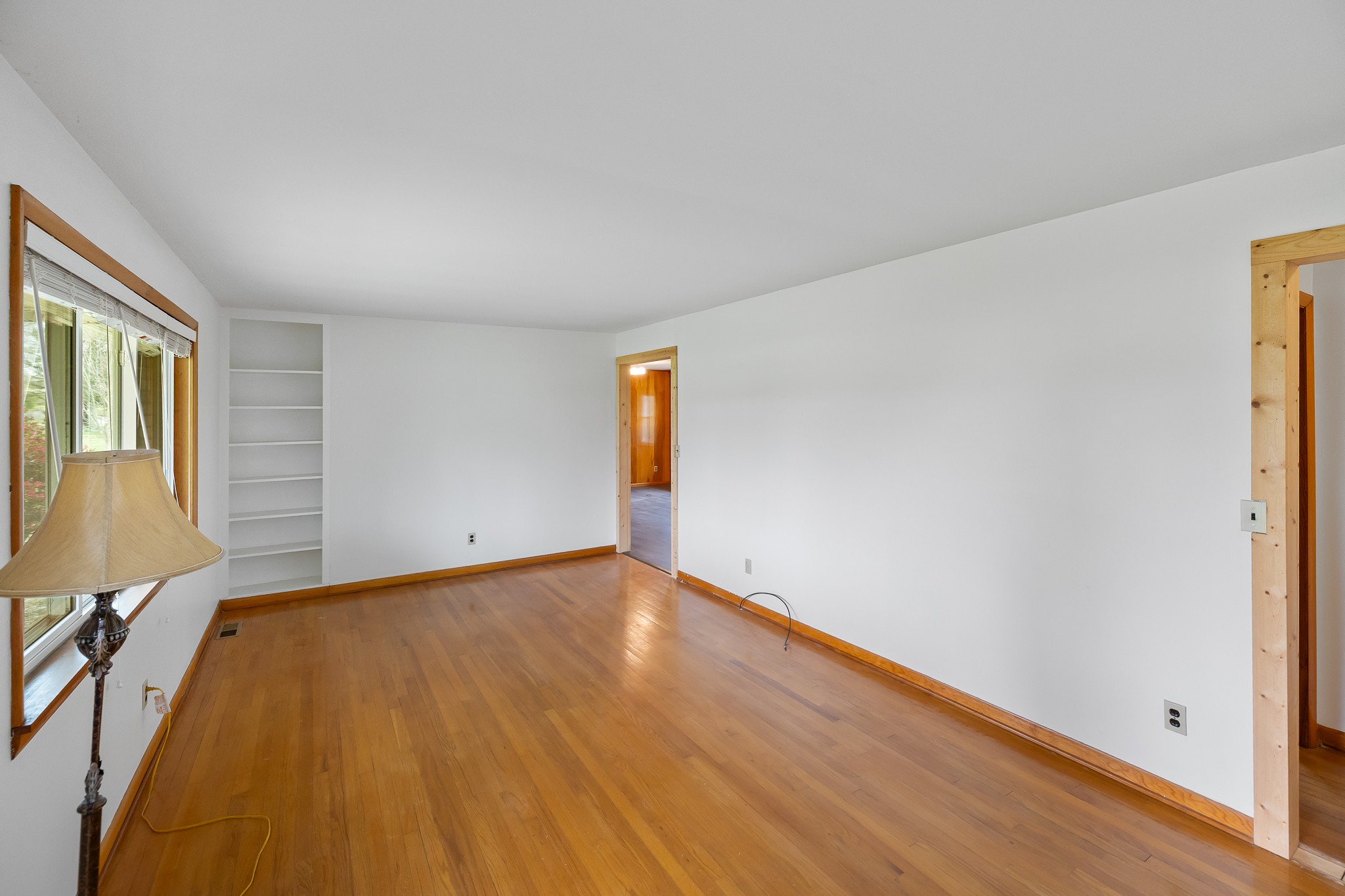 111 Cothron Drive Lafayette, TN 37083 - Photo 11 of 33 a view of a livingroom with wooden floor