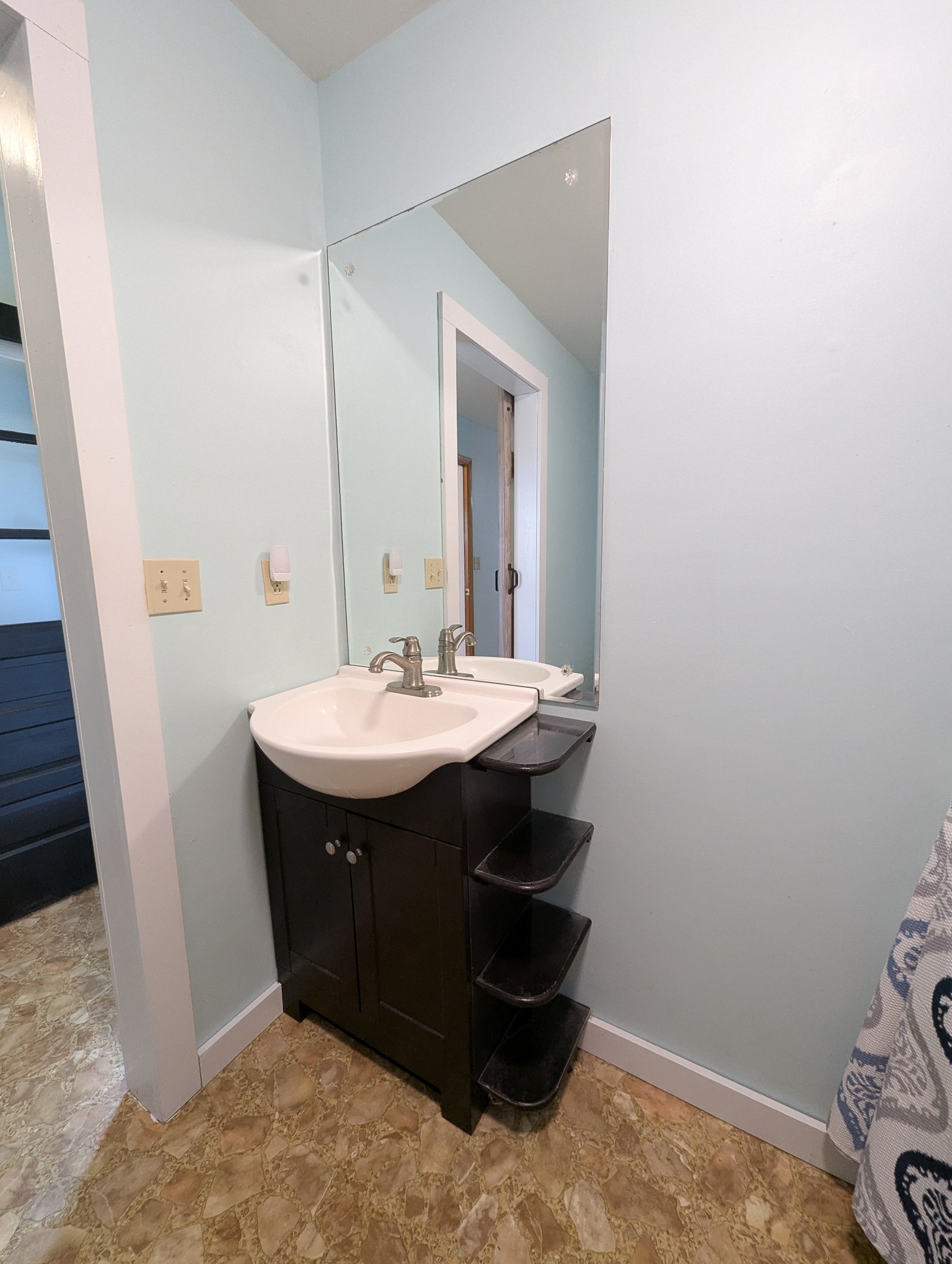 111 Cothron Drive Lafayette, TN 37083 - Photo 25 of 33 a sink and a mirror in a room