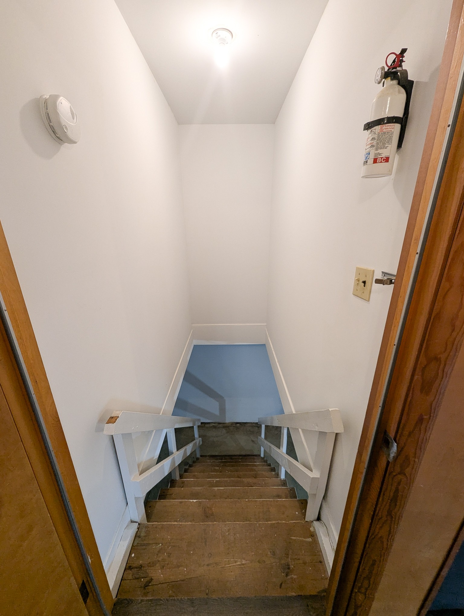 111 Cothron Drive Lafayette, TN 37083 - Photo 28 of 33 a room with wooden floor and staircase