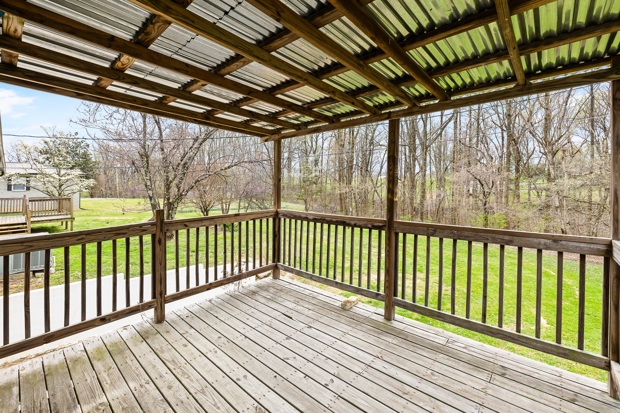 111 Cothron Drive Lafayette, TN 37083 - Photo 9 of 33 a view of a balcony with wooden floor