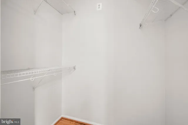 a view of a room with racks on the wall