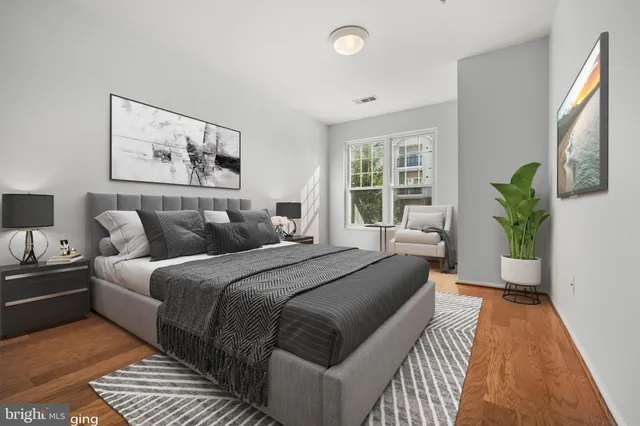 a bed room with a bed and a couch