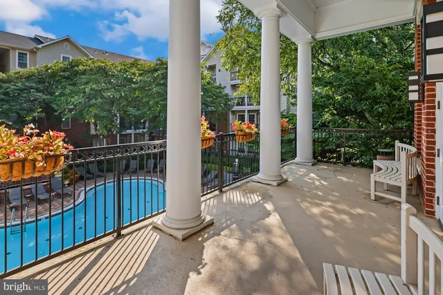 a view of a balcony with wooden floor