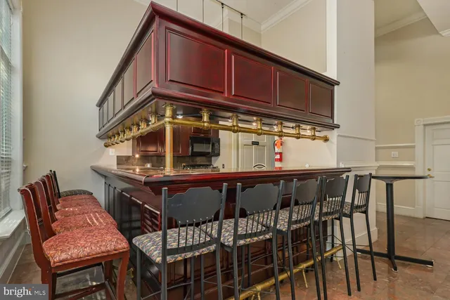 a view of a chairs and table on the deck