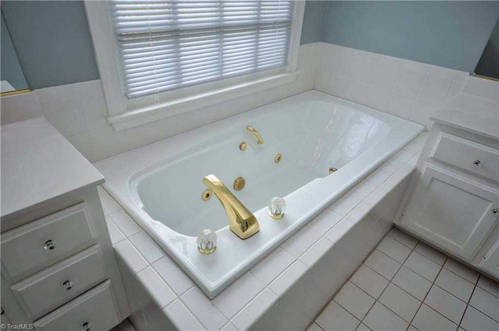 1718 Chickadee Point High Point, NC 27262 - Photo 25 of 30 Master Bath with jetted soaking tub, dual vanities and separate shower.