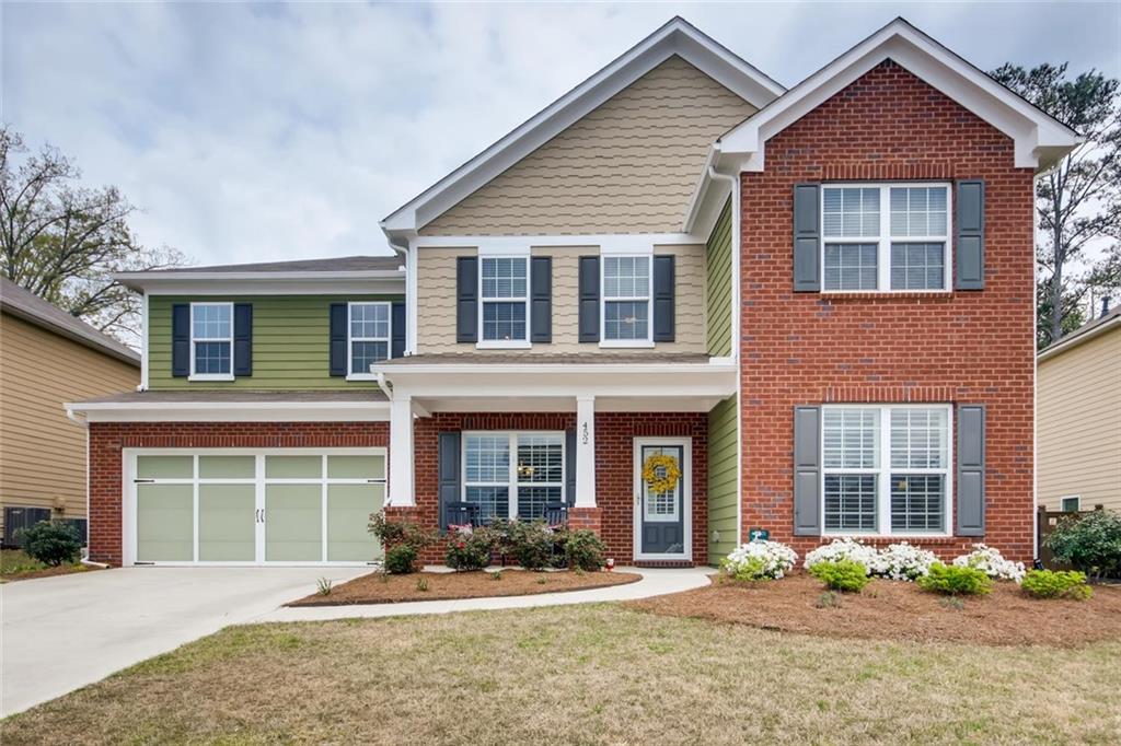 452 Spring View Drive Woodstock, GA 30188 - Photo 1 of 1 Beautiful curb appeal - upgraded true Craftsman columns - professional landscaping added by sellers