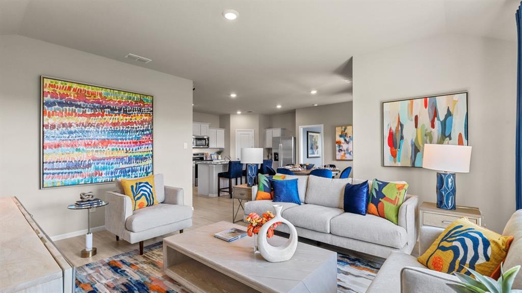 321 Blanco Drive Azle, TX 76020 - Photo 8 of 40 a living room with furniture and a flat screen tv