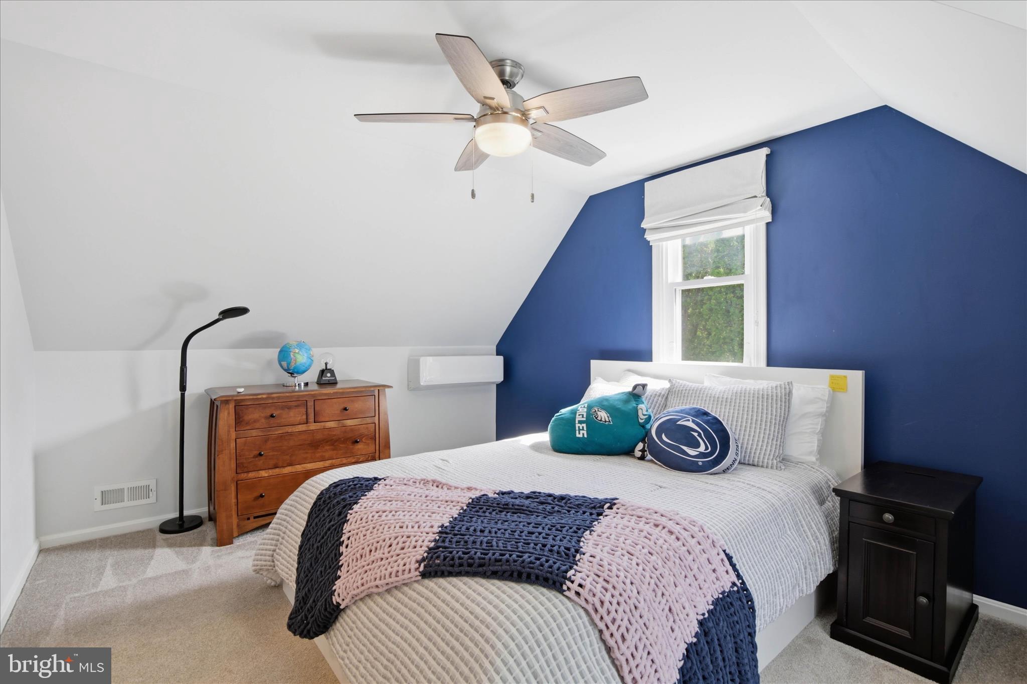 237 Delp Road Lancaster, PA 17601 - Photo 30 of 47 a bedroom with a bed and a chandelier