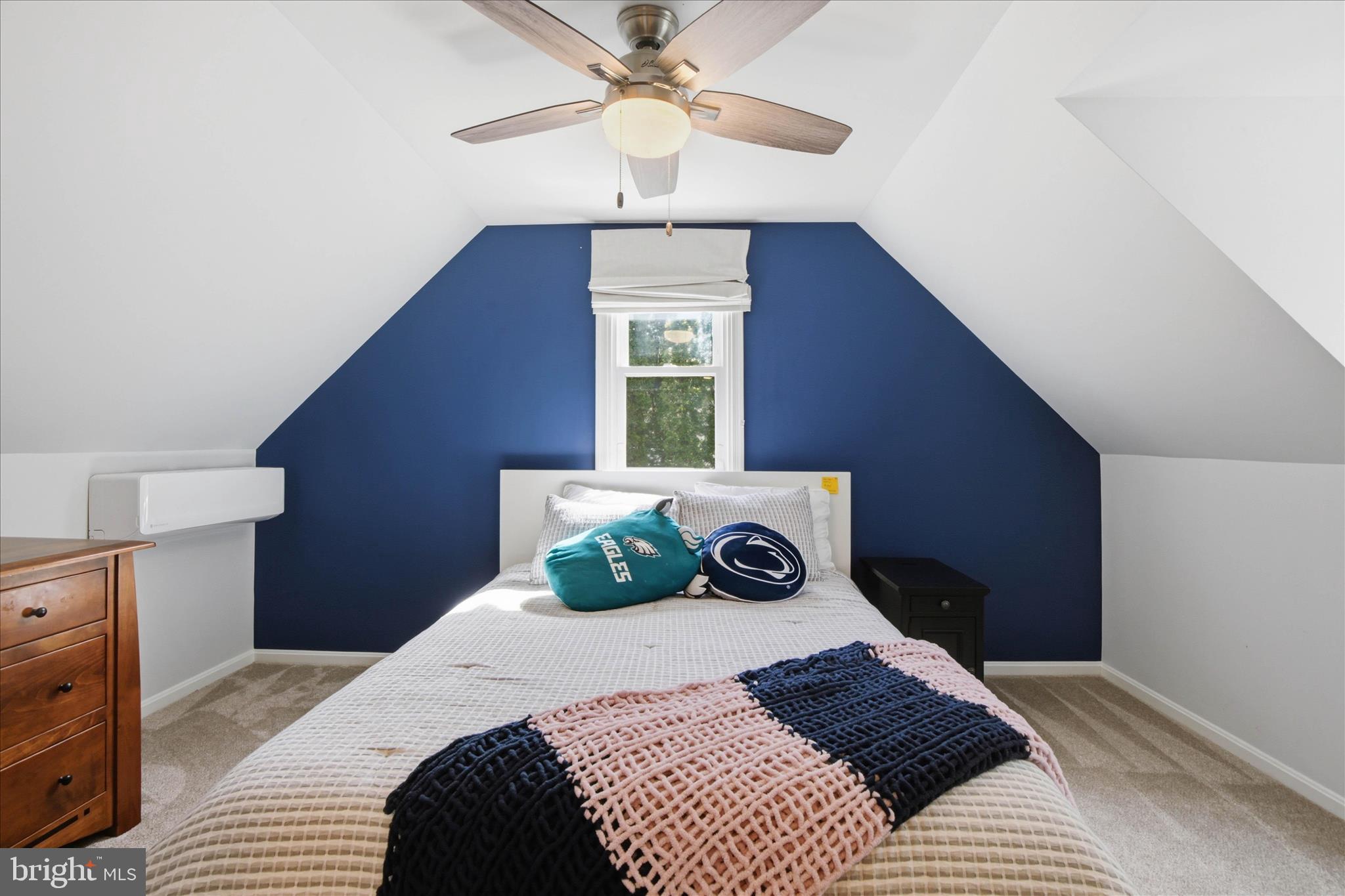 237 Delp Road Lancaster, PA 17601 - Photo 31 of 47 a bedroom with a bed and a chandelier