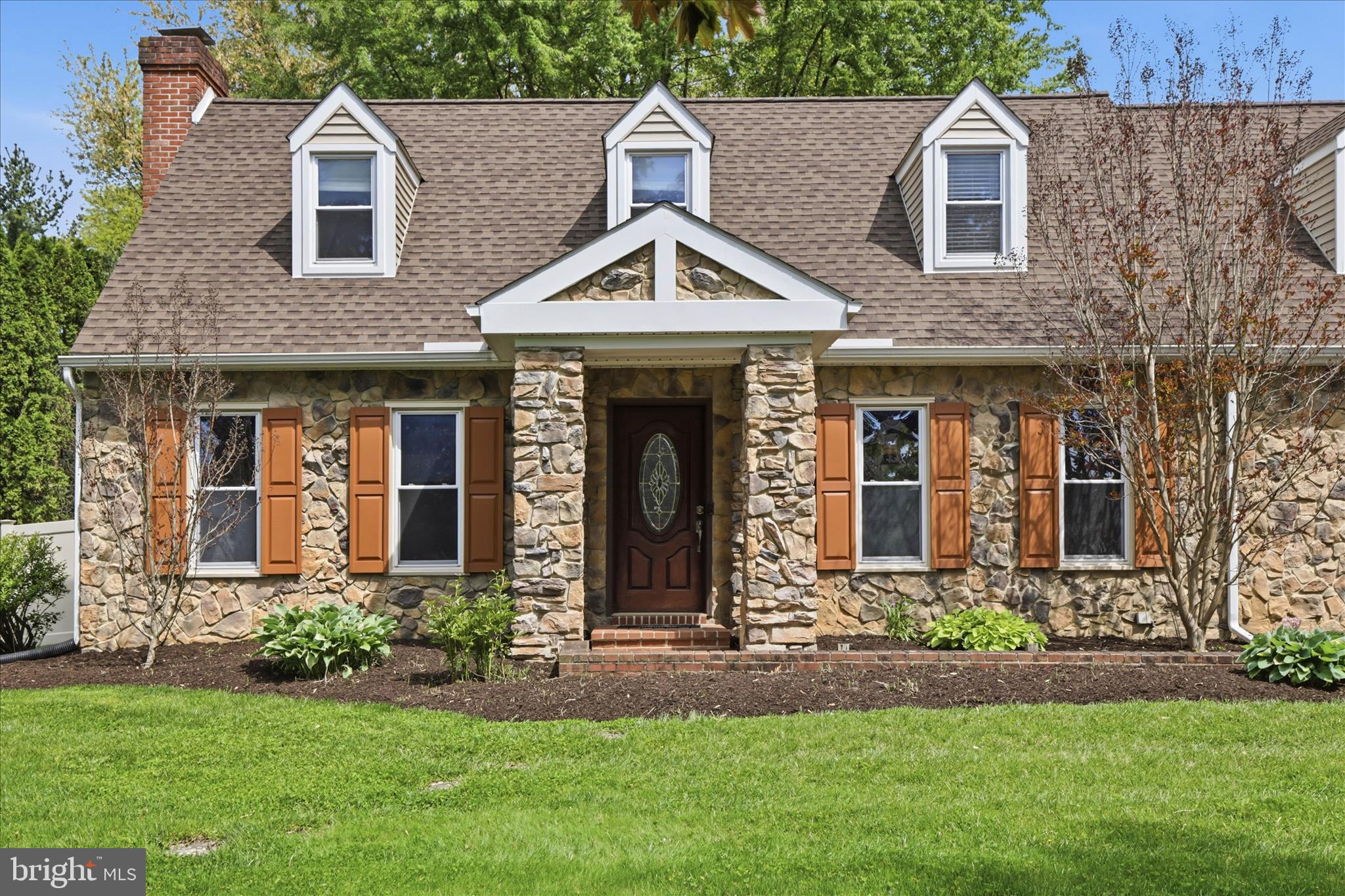 237 Delp Road Lancaster, PA 17601 - Photo 5 of 47 a front view of a house with garden