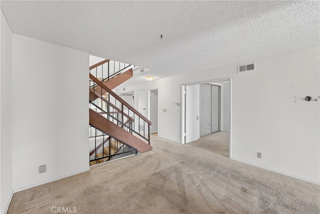 28307 Ridgehaven Court, Unit 72 Rancho Palos Verdes, CA 90275 - Photo 11 of 60 a view of a hallway with staircase