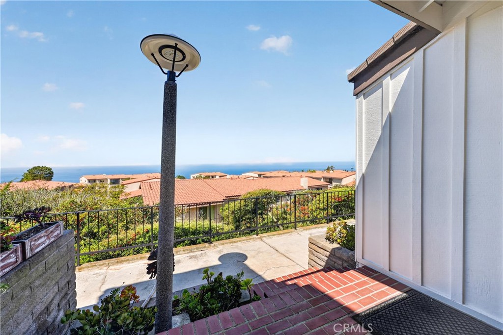 28307 Ridgehaven Court, Unit 72 Rancho Palos Verdes, CA 90275 - Photo 3 of 60 a view of a porch with a floor to ceiling windows