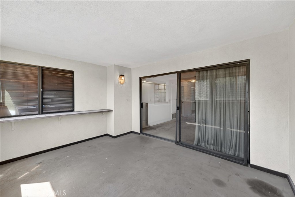 28307 Ridgehaven Court, Unit 72 Rancho Palos Verdes, CA 90275 - Photo 33 of 60 an empty room with sliding door