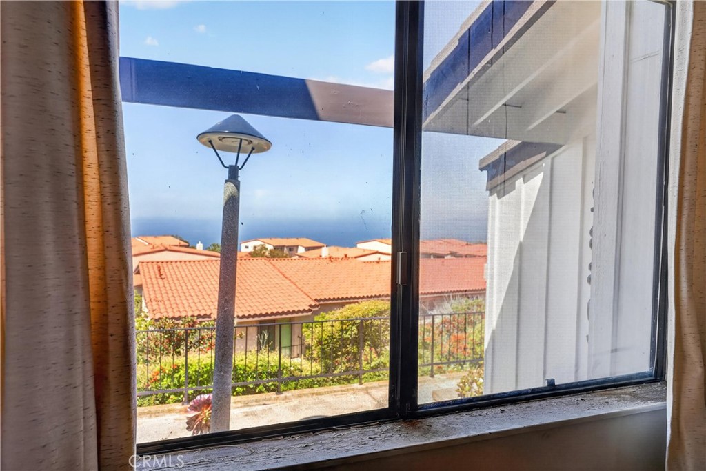 28307 Ridgehaven Court, Unit 72 Rancho Palos Verdes, CA 90275 - Photo 35 of 60 a view of an entryway with a floor to ceiling window