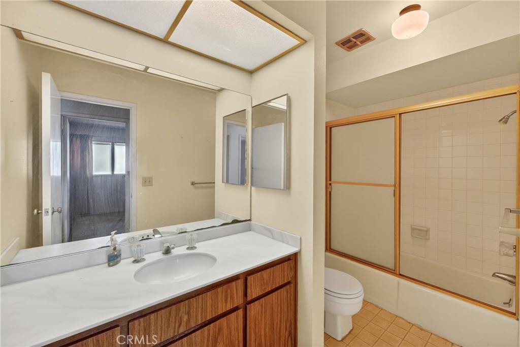 28307 Ridgehaven Court, Unit 72 Rancho Palos Verdes, CA 90275 - Photo 37 of 60 a bathroom with a sink toilet and shower