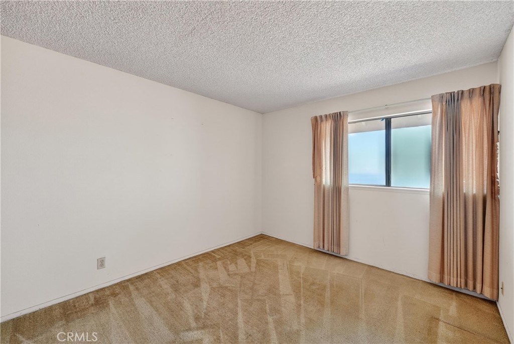 28307 Ridgehaven Court, Unit 72 Rancho Palos Verdes, CA 90275 - Photo 43 of 60 an empty room with windows