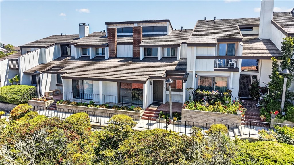 28307 Ridgehaven Court, Unit 72 Rancho Palos Verdes, CA 90275 - Photo 51 of 60 a view of a building with many windows