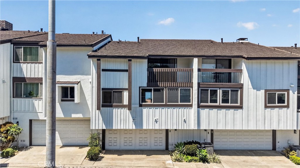 28307 Ridgehaven Court, Unit 72 Rancho Palos Verdes, CA 90275 - Photo 55 of 60 a front view of a house with a yard