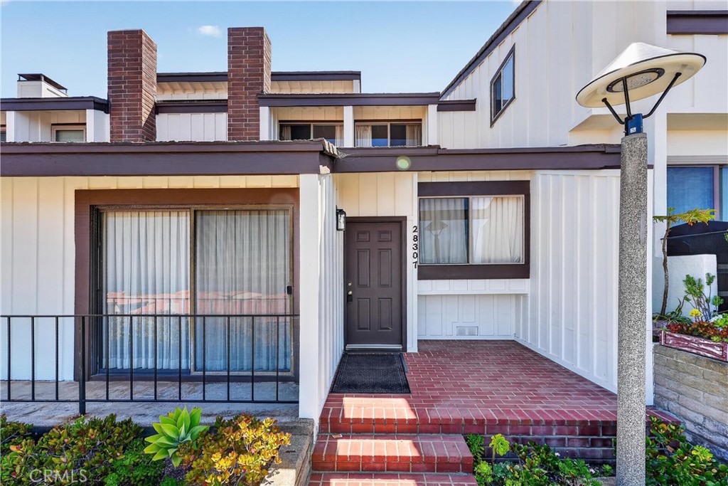 28307 Ridgehaven Court, Unit 72 Rancho Palos Verdes, CA 90275 - Photo 6 of 60 a view of front door of house
