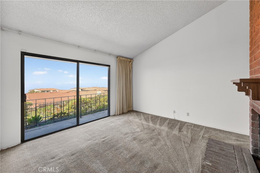 28307 Ridgehaven Court, Unit 72 Rancho Palos Verdes, CA 90275 - Photo 7 of 60 a view of a room with sliding glass door