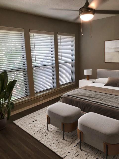 18240 Midway Road, Unit 303 Dallas, TX 75287 - Photo 14 of 22 a bedroom with furniture and a window