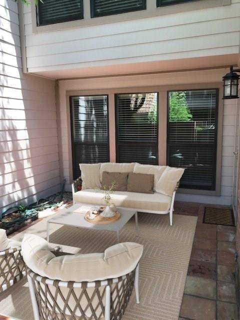 18240 Midway Road, Unit 303 Dallas, TX 75287 - Photo 22 of 22 a dining room with furniture and wooden floor