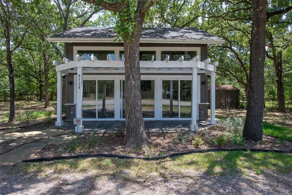 6120 Payne Road Log Cabin, TX 75148 - Photo 19 of 31 a front view of a house with a yard